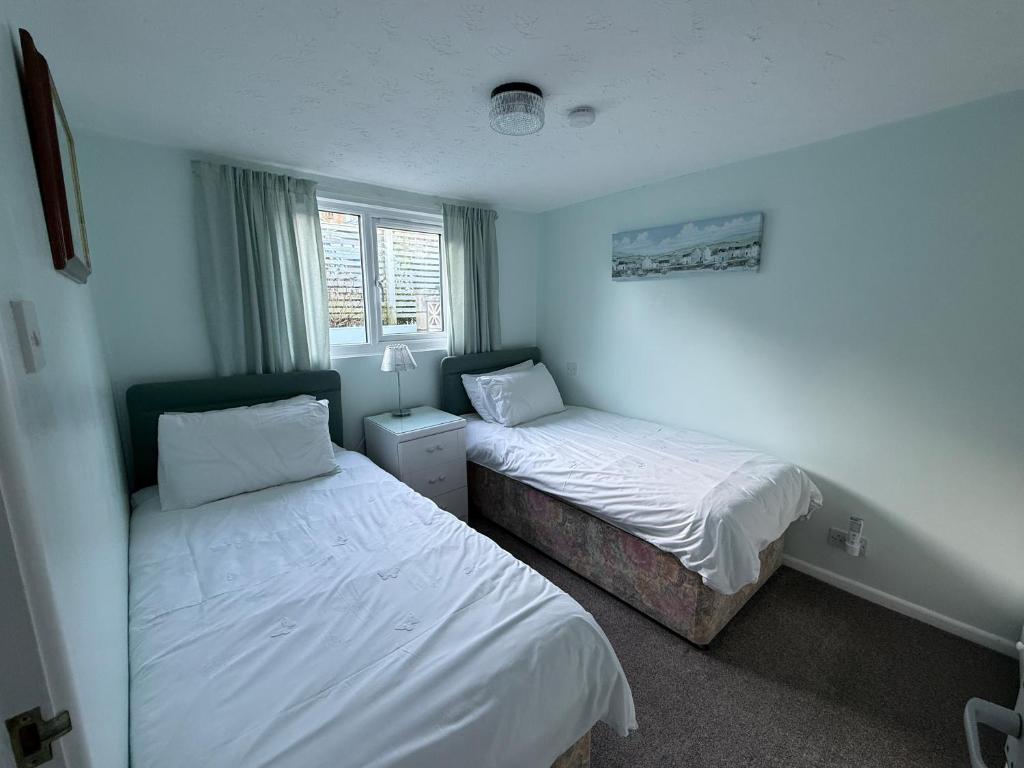 Twin bedroom with coastal colours
